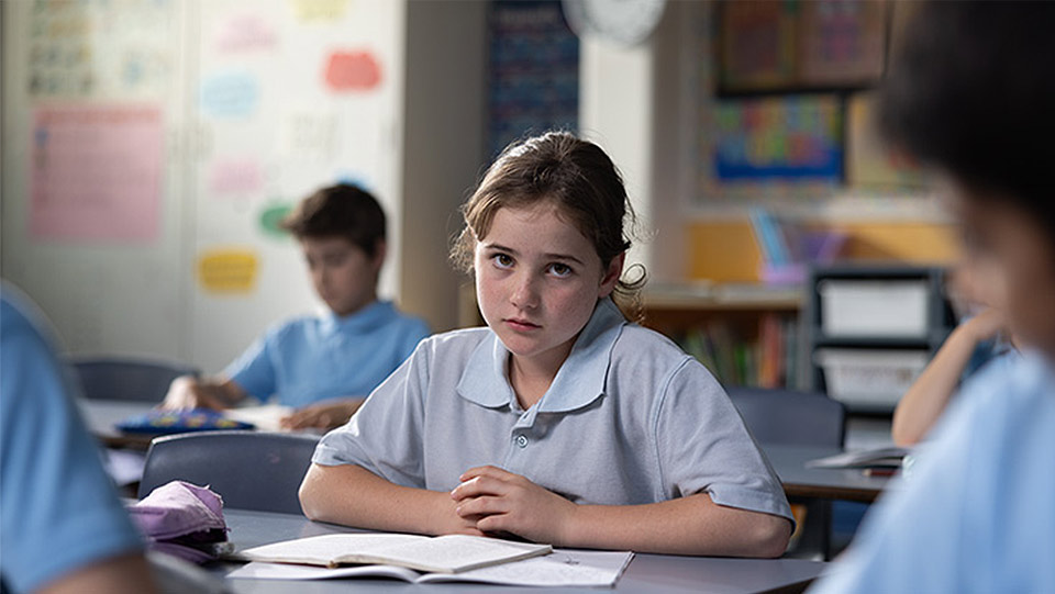 a school girl in a classroom