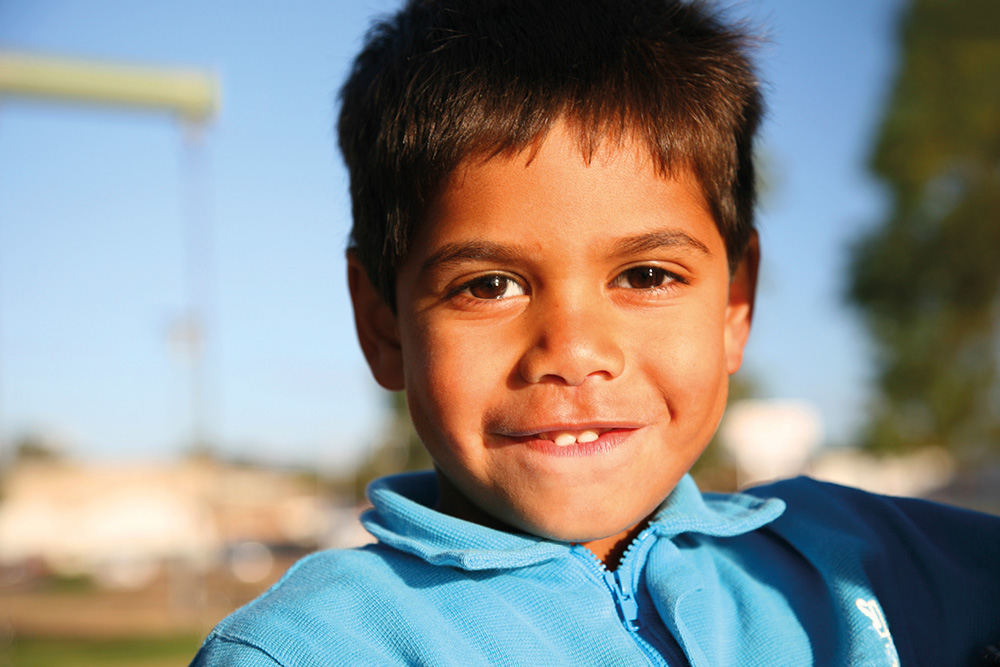 Learning Pathway - Young student with school uniform on smiling